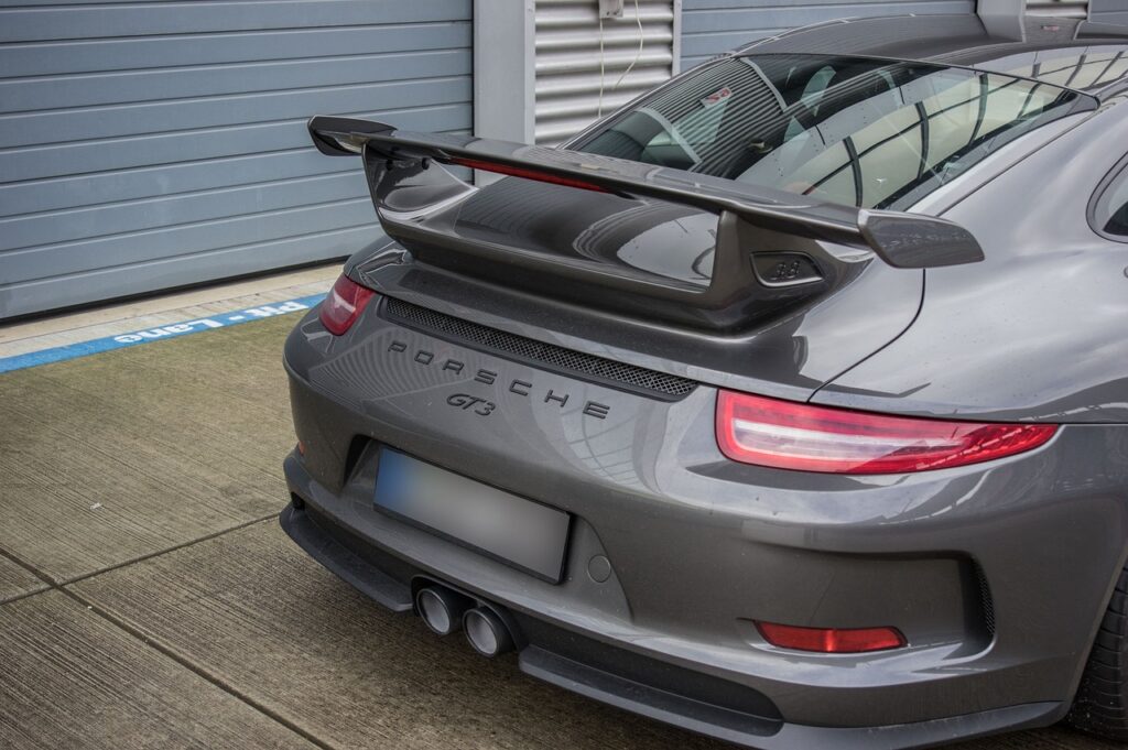 automobile, porsche, rear spoiler, sports car, transport system, vehicle, athletic